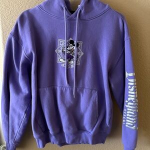 Disney 100 Purple sweatshirt sold in parks
